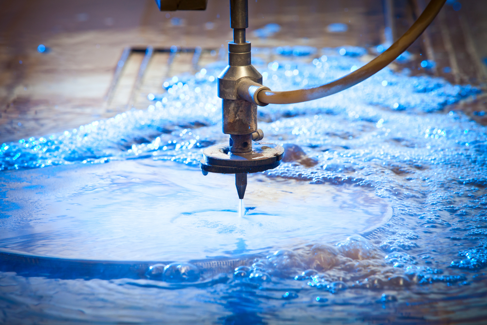 Water-jet,Machine,At,Work,Cutting,A,Steel,Plate.,Detail.